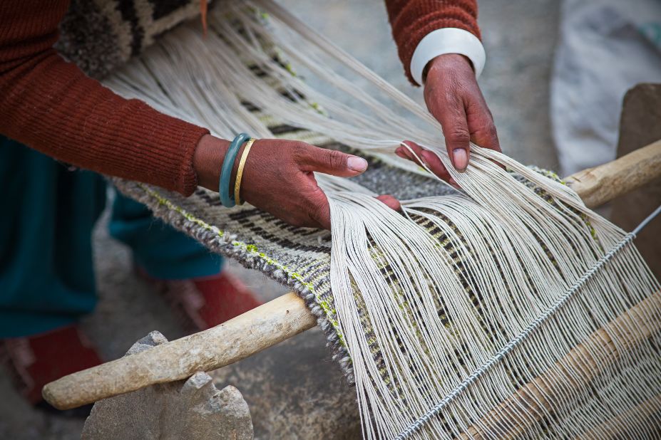 Many Changpa women have given up the nomadic life and now spend much of their time weaving at home outside the city of Leh.