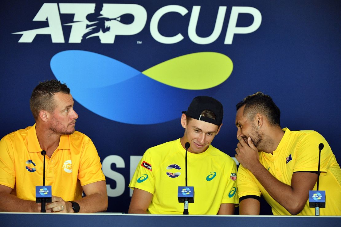 Kyrgios (right) will star for an Australian team featuring Alex de Minaur and captained by Lleyton Hewitt (left) at the ATP Cup.