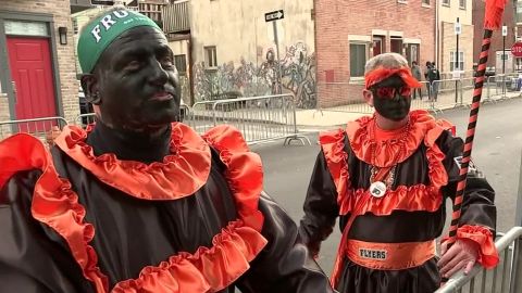 Philadelphia Mayor Jim Kenney has disqualified a mummers group after at least two members wore blackface paint to the city's annual Mummers parade.