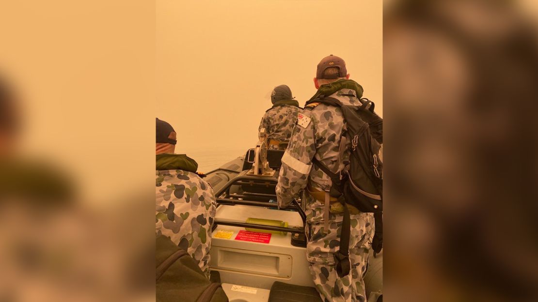 The Australian military assisting with bushfire evacuations.