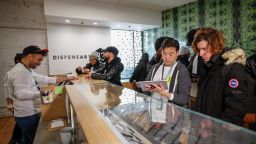 Customers shop for a recreational marijuana at Dispensary 33 store on January 1, 2020 in Chicago, Illinois. - On the first day of 2020, recreational marijuana  became legal in Illinois, which joins 10 other US states with legal use of recreational marijuana. (Photo by KAMIL KRZACZYNSKI/AFP via Getty Images)