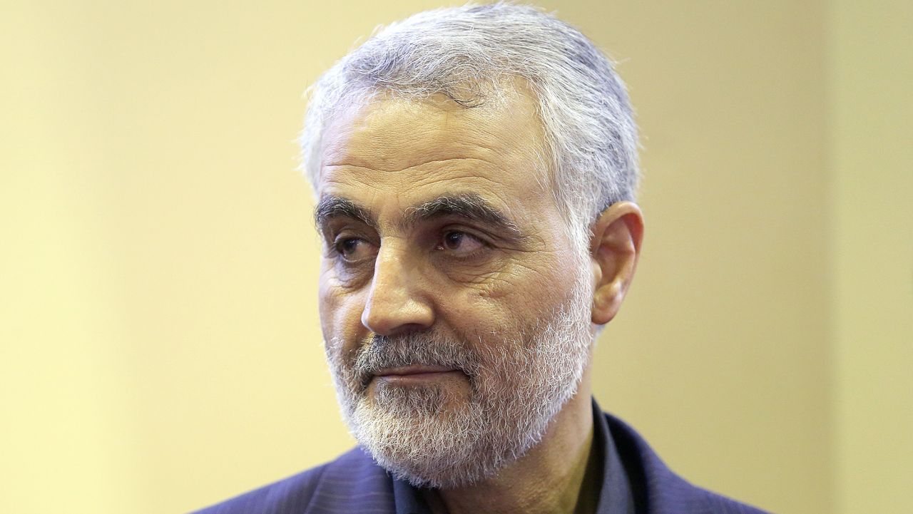 (FILES) In this picture taken on September 14, 2013, the commander of the Iranian Revolutionary Guard's Quds Force, Gen. Qassem Suleimani, is seen as people pay their condolences following the death of his mother in Tehran. For a man widely reported to be playing a key role in helping Iraq's routed military recover lost ground, Qassem Suleimani, 57, the commander of Iran's feared Quds Force, remains invisible. AFP PHOTO/ISNA/MEHDI GHASEMI (Photo by MEHDI GHASEMI / ISNA / AFP)        (Photo credit should read MEHDI GHASEMI/AFP via Getty Images)