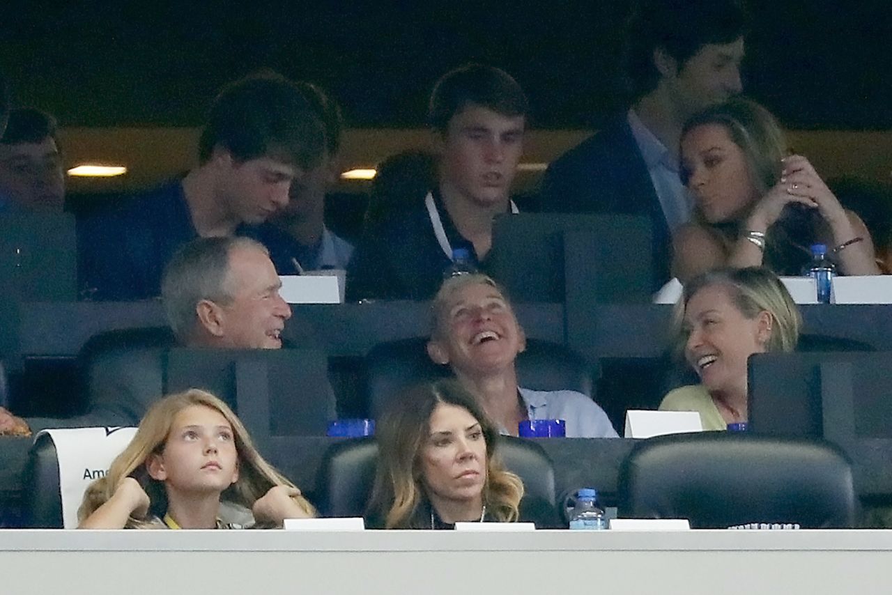 Former US President George W. Bush shares a laugh with DeGeneres and de Rossi at an NFL football game in 2019. Some people criticized DeGeneres online for hanging out with Bush. DeGeneres <a href="https://www.cnn.com/2019/10/08/entertainment/ellen-degeneres-george-bush/index.html" target="_blank">addressed it on her show.</a> "Just because I don't agree with someone on everything doesn't mean that I'm not going to be friends with them," she said. "When I say, 'be kind to one another,' I don't only mean the people that think the same way that you do. I mean be kind to everyone."