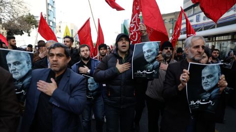 Protesters mourn the death of Qasem Soleimani Friday in the Iranian capital, Tehran.