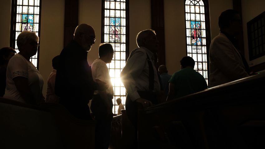 KNOXVILLE, TN - AUGUST 25:  Knoxville residents participate in a service of prayers and hymns for peace in advance of a planned white supremacist rally and counter-protest around a Confederate memorial monument on August 25, 2017 in Knoxville, Tennessee. People congregated at the Second United Methodist Church, one of two churches holding prayer services, to sing, pray and light candles for peace and racial harmony. The planned rally around a disputed Confederate memorial comes two weeks after a gathering of white supremacists and counter demonstrators in Charlottesville, Virginia that turned deadly.  (Photo by Spencer Platt/Getty Images)