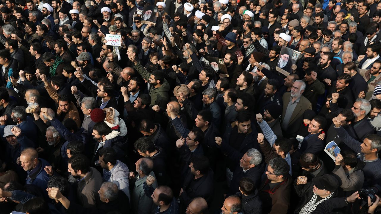 Protesters demonstrate over the U.S. airstrike in Iraq that killed Iranian Revolutionary Guard Gen. Qassem Soleimani in Tehran, Iran, Jan. 3, 2020. Iran has vowed "harsh retaliation" for the U.S. airstrike near Baghdad's airport that killed Tehran's top general and the architect of its interventions across the Middle East, as tensions soared in the wake of the targeted killing. (AP Photo/Vahid Salemi)
