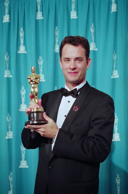 Hanks holds his Oscar at the 1994 Academy Awards.
