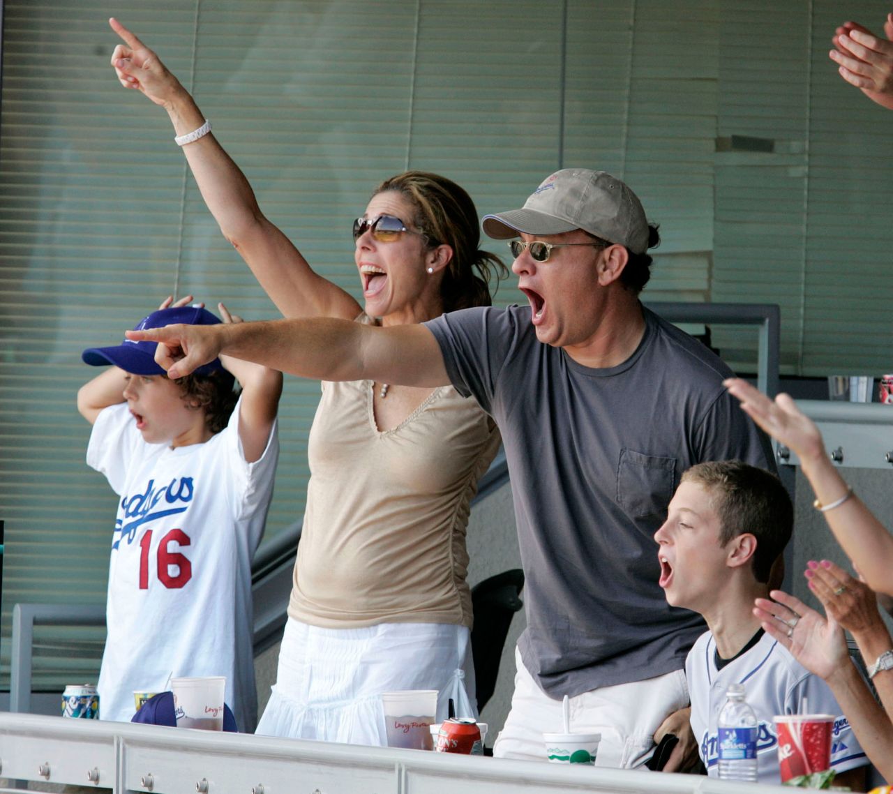 Hanks, his wife and two of his children attend a Los Angeles Dodgers baseball game in 2004. Hanks also has a son and a daughter from his first marriage to Samantha Lewes.