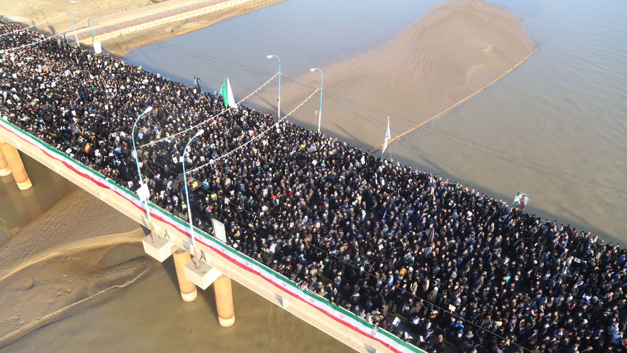 Mourners cross a bridge in Ahvaz, Iran, to attend a funeral ceremony for Gen. Qassem Soleimani, who was killed in Iraq in a US drone strike.