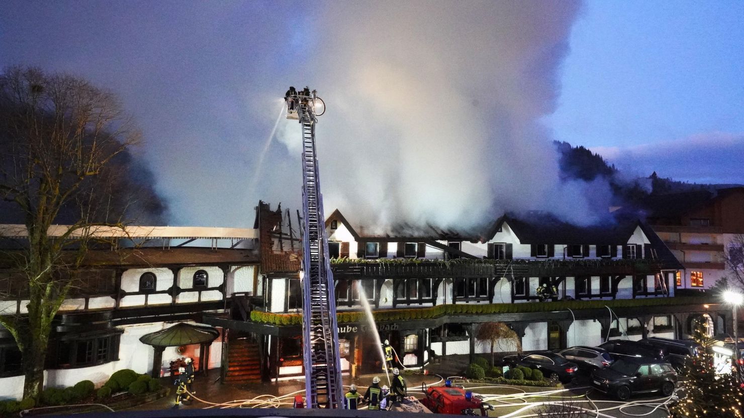 05 January 2020, Baden-Wuerttemberg, Baiersbronn: Fire brigade personnel extinguish a fire in the old building of the restaurant in the hotel "Traube Tonbach". According to police reports, the fire in the three-star restaurant in the Black Forest caused damage in the seven-digit range. Photo: Andreas Rosar/dpa (Photo by Andreas Rosar/picture alliance via Getty Images)