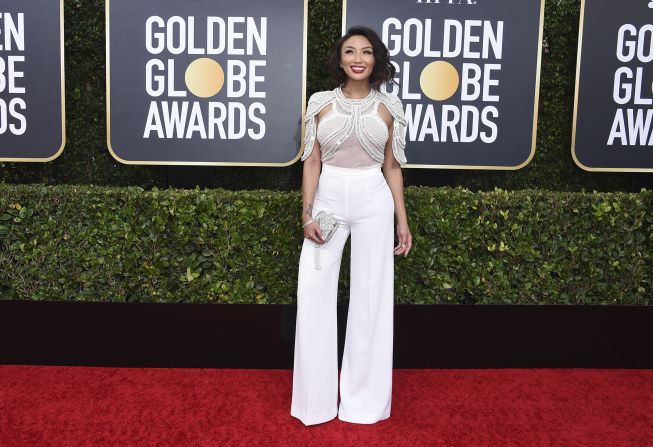 Jeannie Mai wore a beaded bodice with floor-length white pants.
