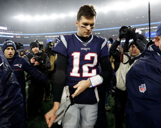 New England quarterback Tom Brady walks off the field after the Patriots lost to Tennessee in the NFL playoffs on Saturday, January 4. <a href="index.php?page=&url=https%3A%2F%2Fwww.cnn.com%2F2020%2F01%2F05%2Fus%2Ftitans-patriots-nfl-playoffs%2Findex.html" target="_blank">Was it his last game?</a> He will become a free agent in March, and he'll be 43 years old when next season starts. "I don't know what the future looks like, and I'm not going to predict it," said the six-time Super Bowl champion. When asked if there was a possibility that he would retire, he said retirement is "pretty unlikely, hopefully unlikely."