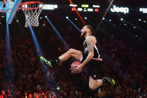 French basketball player Isaia Cordinier competes in the slam dunk contest during All-Star Game festivities in Paris on Sunday, December 29.