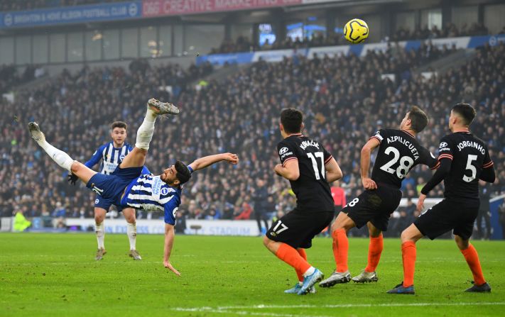 Brighton's Alireza Jahanbakhsh<a href="index.php?page=&url=https%3A%2F%2Fwww.cnn.com%2F2020%2F01%2F01%2Ffootball%2Foverhead-kick-jahanbakhsh-brighton-chelsea-spt-intl%2Findex.html" target="_blank"> scores a spectacular goal </a>during a Premier League match against Chelsea on Wednesday, January 1. The match in Brighton, England, ended 1-1.