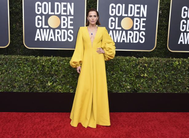 Star of "The Politician," Zoey Deutch, shines in a bright yellow Fendi jumpsuit and more than 100 carats of Harry Winston diamonds and sapphires.