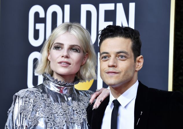 Lucy Boynton and Rami Malek made quite the stylish couple. Malek wore classic tailoring by Saint Laurent, while Boynton sported a metallic silver Louis Vuitton gown with artistic eye make-up.