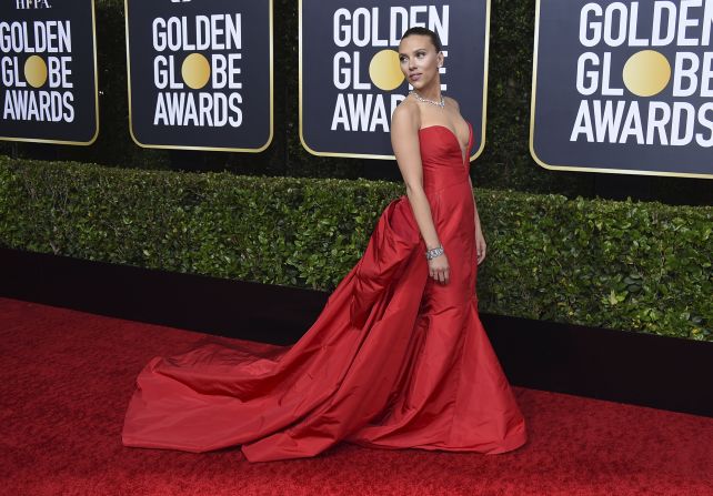 Scarlett Johansson wore a plunging red gown by Vera Wang. Scroll through to see more looks from the 77th Golden Globe Awards.