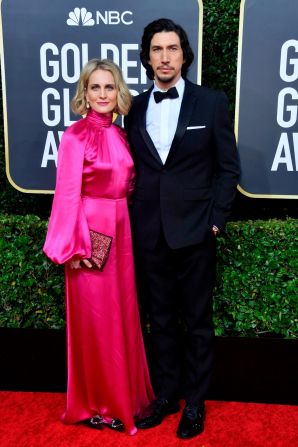 Adam Driver, pictured with his wife Joanne Tucker, looked suave in a custom Burberry.