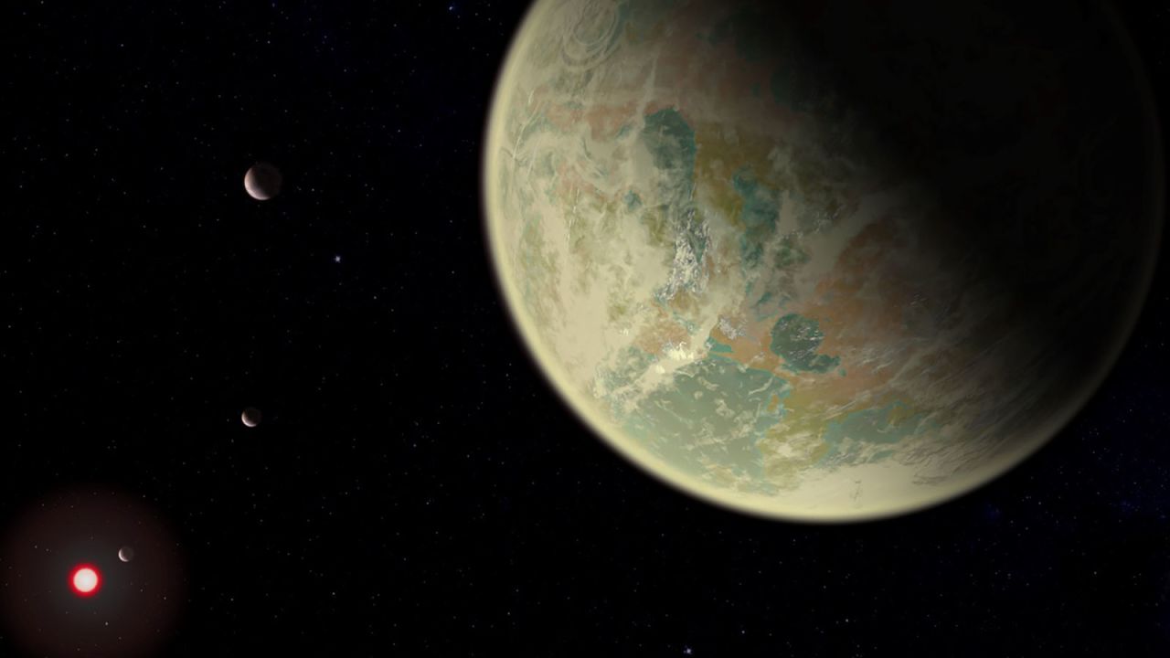 This artist's illustration shows a wet exoplanet with an oxygen atmosphere. The red sphere is the M-dwarf star the exoplanet orbits.