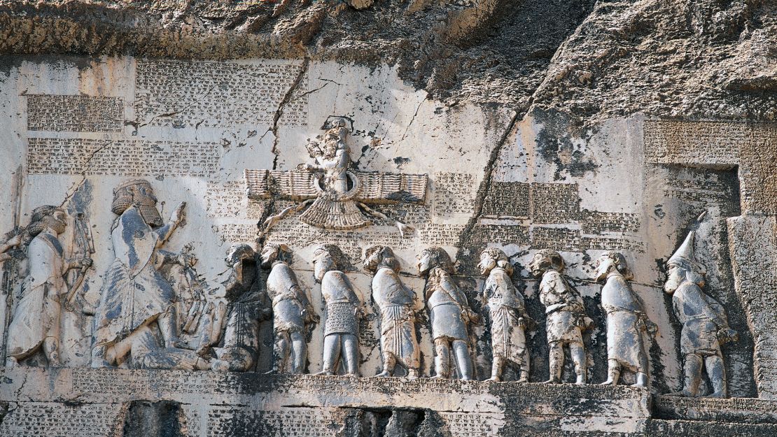 The rock relief depicting the victory of King Darius over Gaumata.