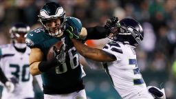 Philadelphia Eagles' Zach Ertz, left, tries to hold off Seattle Seahawks' Quandre Diggs during the second half of an NFL wild-card playoff football game, Sunday, Jan. 5, 2020, in Philadelphia. (AP Photo/Julio Cortez)