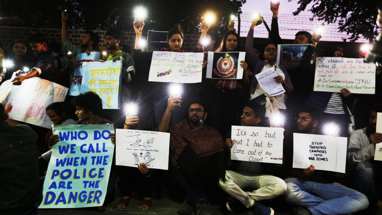 Students protest at New Delhi's Jawaharlal Nehru University on Monday, a day after masked assailants attacked students on campus. 