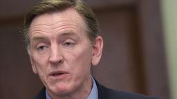 US Rep. Paul Gosar (L), R-AZ, speaks during a press conference on January 7, 2016 to announce legislation that would revoke actor Bill Cosby's Medal of Freedom on Capitol Hill in Washington, DC. The move for the legislatioin comes after Cosby was charged with sexual assualt following a series of rape allegations. 