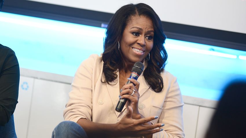 WASHINGTON, DC - JUNE 14:  Former First Lady Michelle Obama and recent Yale graduate Ryan Liu speak at the Reach Higher Initiative Beating the Odds Summit to support first-generation college-bound students on June 14, 2018 in Washington, DC.  (Photo by Shannon Finney/Getty Images)