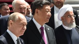 Russian President Vladimir Putin, Chinese President Xi Jinping and Iran's President Hassan Rouhani walk as they attend a meeting of the Shanghai Cooperation Organisation (SCO) Council of Heads of State in Bishkek on June 14, 2019. (Photo by Vyacheslav OSELEDKO / AFP)        (Photo credit should read VYACHESLAV OSELEDKO/AFP via Getty Images)