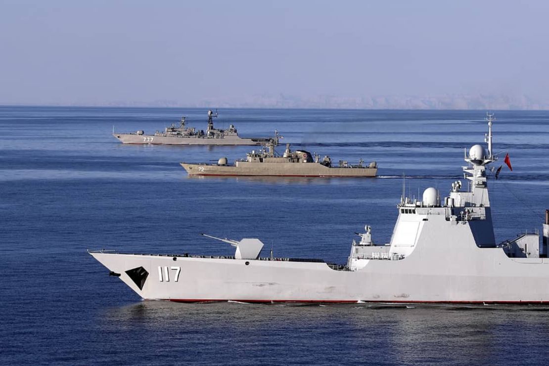 Warships sail in the Gulf of Oman during the second day of joint Iran, Russia and China naval war games in December 2019. 