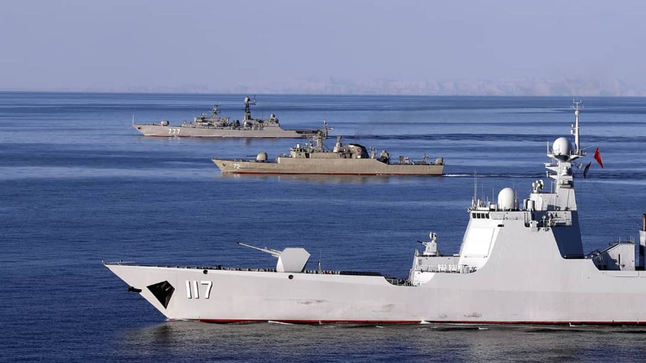 Warships sail in the Gulf of Oman during the second day of joint Iran, Russia and China naval war games in December 2019.