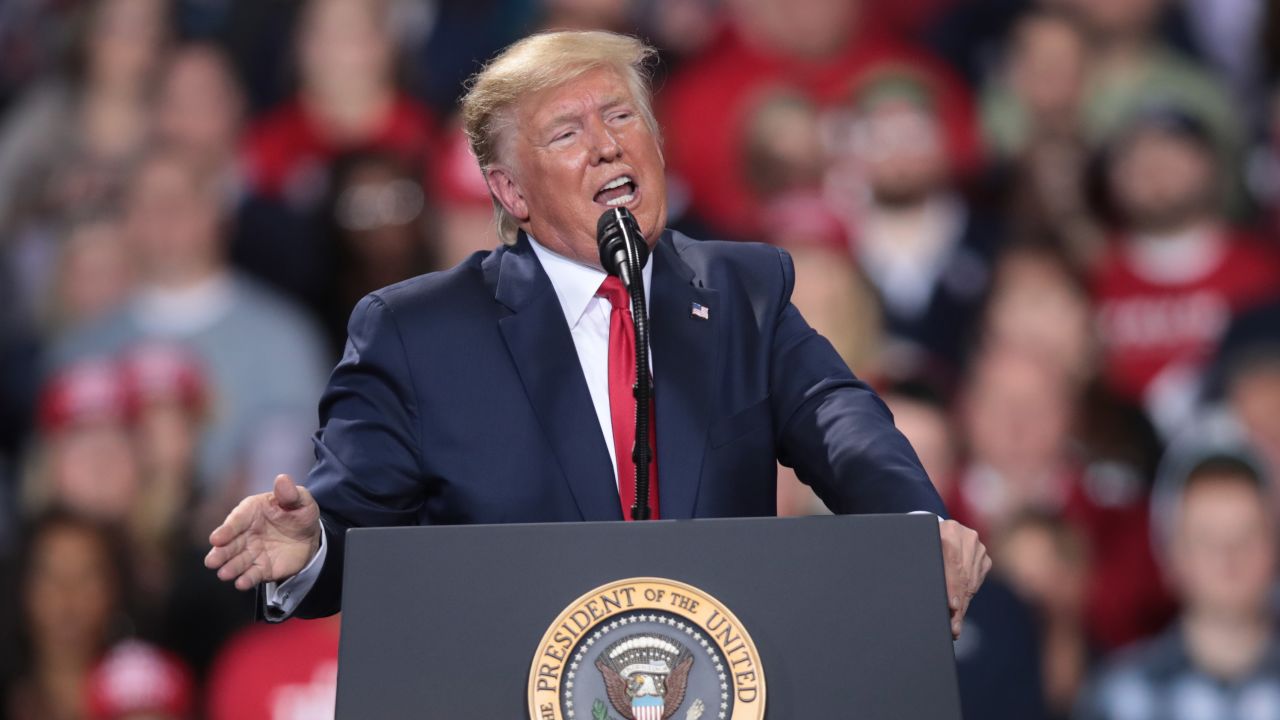 BATTLE CREEK, MICHIGAN - DECEMBER 18: President Donald Trump addresses his impeachment after learning how the vote in the House was divided during a Merry Christmas Rally at the Kellogg Arena on December 18, 2019 in Battle Creek, Michigan. While Trump spoke at the rally the House of Representatives voted, mostly along party lines, to impeach the president for abuse of power and obstruction of Congress, making him just the third president in U.S. history to be impeached.  (Photo by Scott Olson/Getty Images)