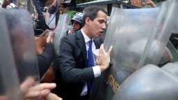 Opposition leader Juan Guaido attempts to surpass the national police block to the National Assembly entrance on January 7, 2020 in Caracas, Venezuela.