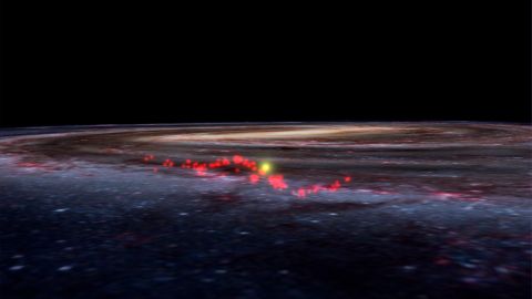 This image shows the Radcliffe Wave, taken from the World Wide Telescope, overlaid on an artist's illustration of the Milky Way and our sun. 