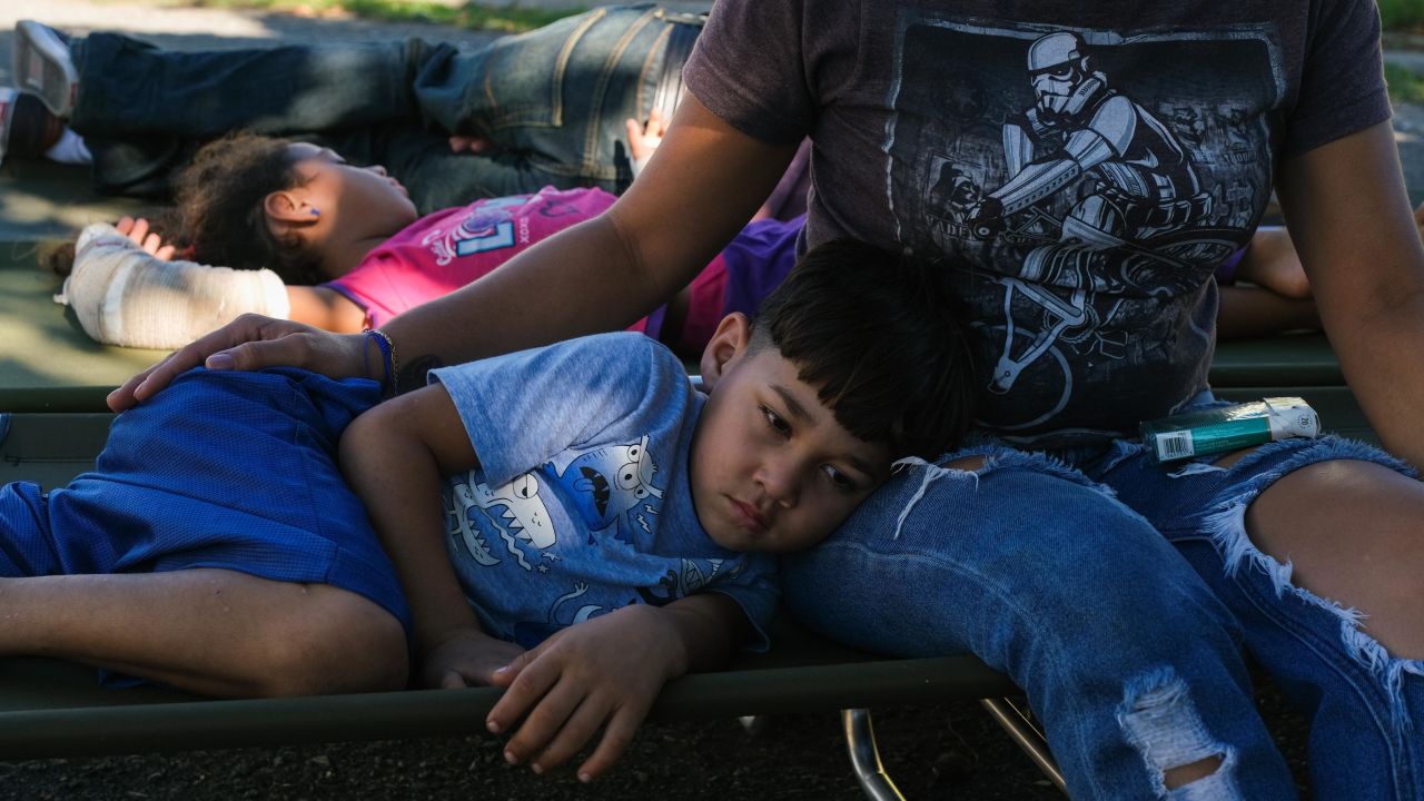 Jasmin Negron Lopez, 28, and her family take refuge at a coliseum in Guanica. 