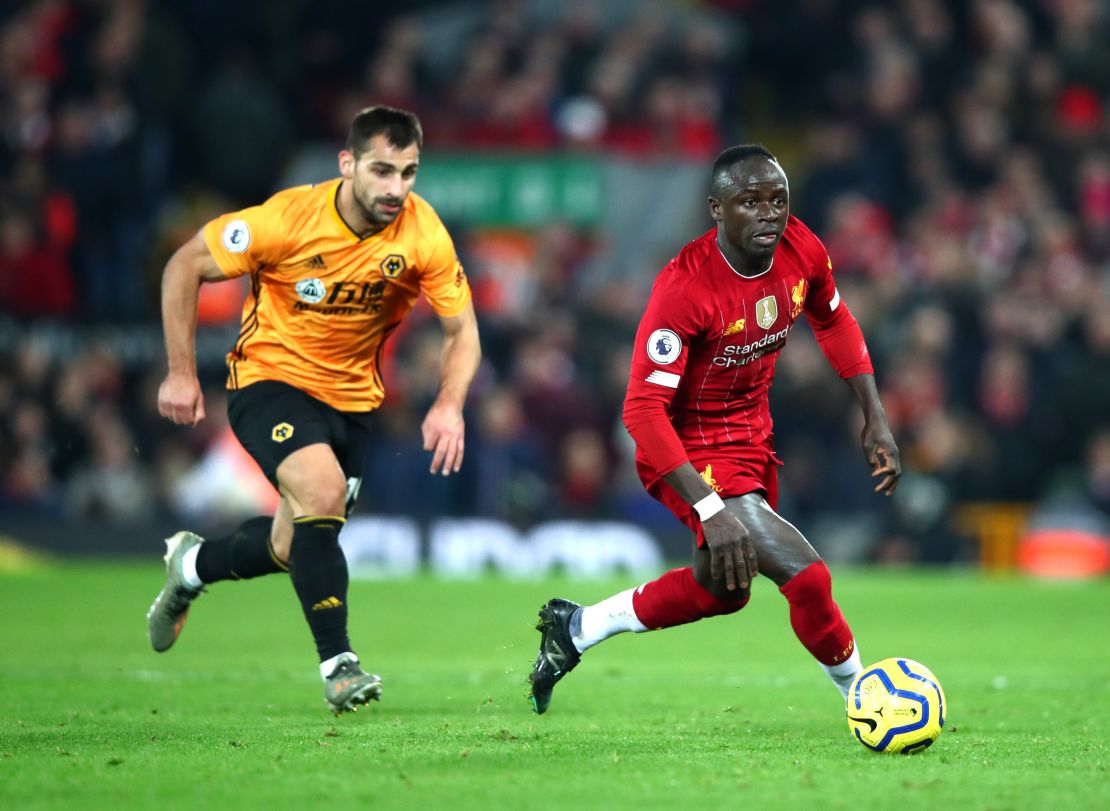Mane (right) controls the ball against Wolves last month.