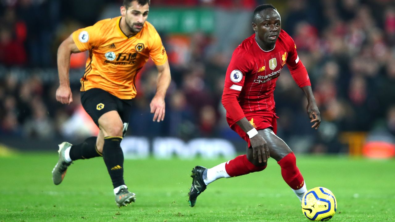 Mane (right) controls the ball against Wolves last month.