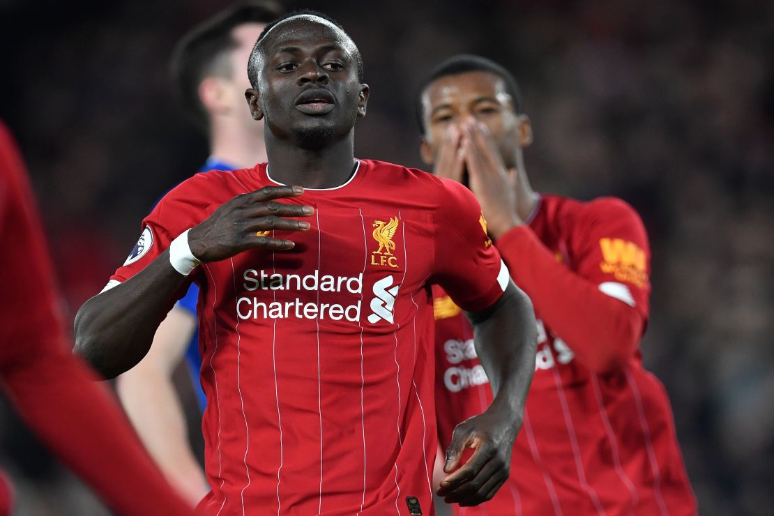 Mane (L) reacts after failing to score during the English Premier League football match between Liverpool and Everton at Anfield on December 4, 2019. 