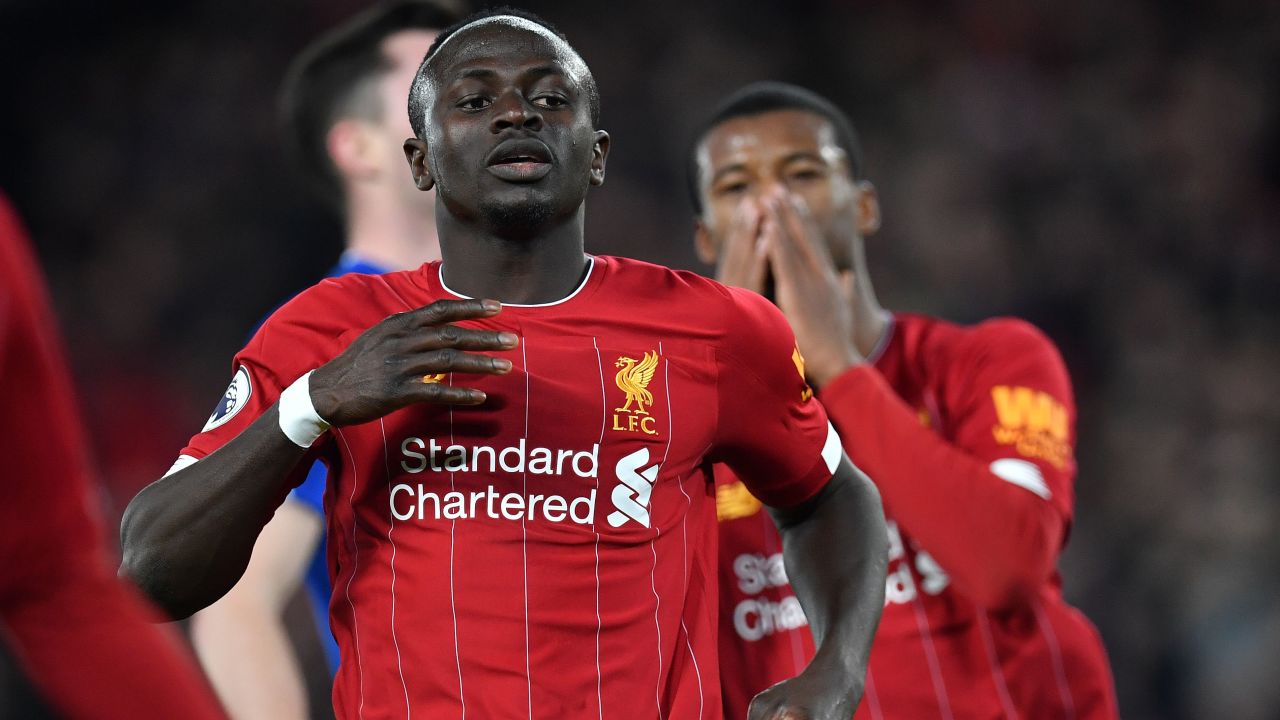 Mane (L) reacts after failing to score during the English Premier League football match between Liverpool and Everton at Anfield on December 4, 2019. 