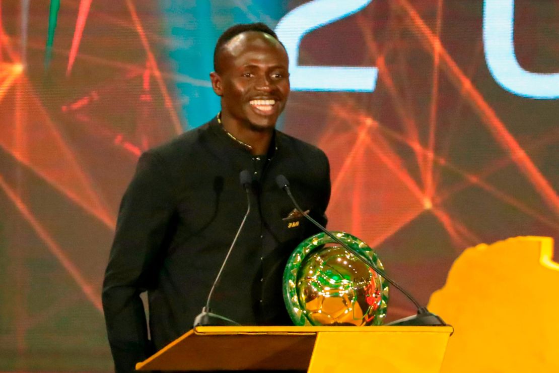 Mane pictured receiving his  Player of the Year award during the 2019 CAF Awards.
