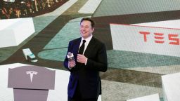 Elon Musk, chief executive officer of Tesla Inc., pauses while speaking during the Tesla China-Made Model 3 Delivery Ceremony at the company's Gigafactory in Shanghai, China, on Tuesday, Jan. 7, 2020. Tesla kicked off production in China, marking a major step in Musks global push for electric-vehicle domination and heralding what could be the dawn of real competition in the worlds largest EV market. Photographer: Qilai Shen/Bloomberg via Getty Images