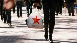 SAN FRANCISCO - NOVEMBER 21:  A shopper carries a bag from Macy's as she walks down Market Street November 21, 2008 in San Francisco, California. Retailers are gearing up for what is predicted to be a dismal holiday shopping season as the country struggles through a rough economy.  (Photo by Justin Sullivan/Getty Images)