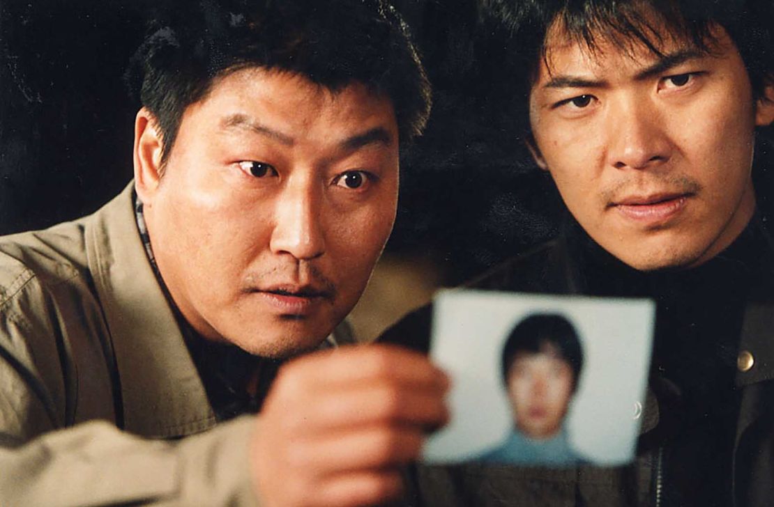 Song Kang Ho and Kim Sang Kyung as two police detectives on the trail of an elusive killer in Bong's 2003 thriller "Memories of Murder."