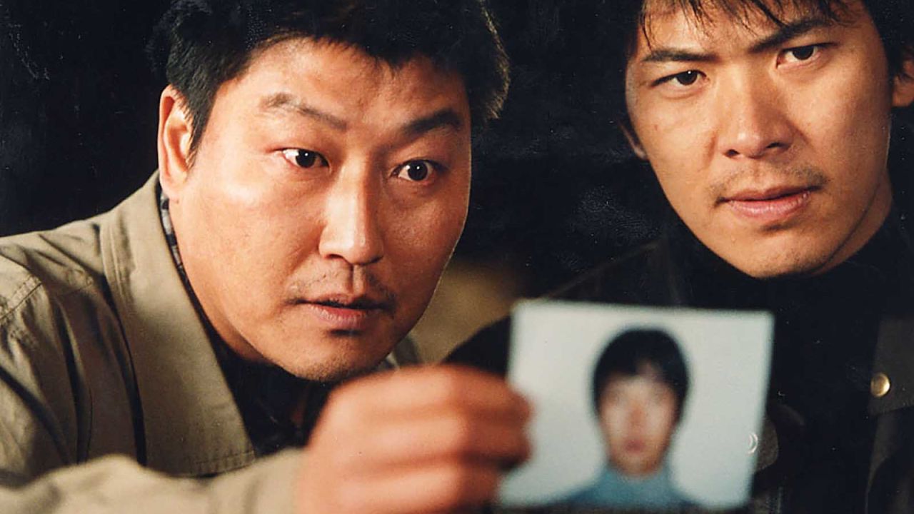 Song Kang Ho and Kim Sang Kyung as two police detectives on the trail of an elusive killer in Bong's 2003 thriller "Memories of Murder."