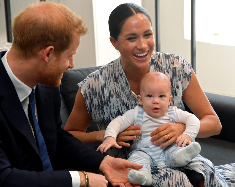 Meghan holds Archie during their royal tour of South Africa in September 2019.