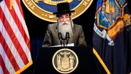 Rabbi Chaim Rottenberg of Congregation Netzach Yisroel, speaks before New York Gov. Andrew Cuomo delivers his State of the State address at the Empire State Plaza Convention Center on Wednesday, Jan. 8, 2020, in Albany, N.Y. (AP Photo/Hans Pennink)
