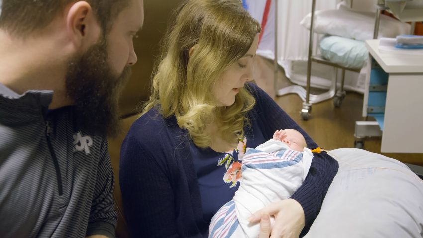 Drew and Jennifer Gobrecht with their son Benjamin Thomas Gobrecht, the second baby in the United States to be born from a transplanted uterus from a deceased donor