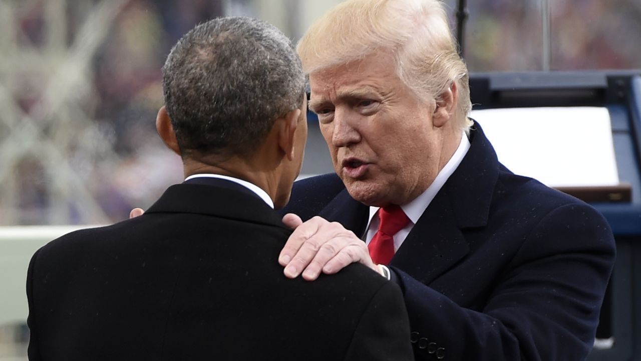 WASHINGTON, DC - JANUARY 20: US President Donald Trump speaks with former President Barack Obama during the Presidential Inauguration at the US Capitol on January 20, 2017 in Washington, DC. Donald J. Trump became the 45th president of the United States today.  (Photo by Saul Loeb - Pool/Getty Images)