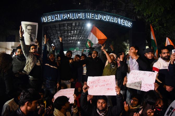 Protestors shout slogans outside the Delhi Police Headquarters following clashes between student groups at Jawaharlal Nehru University in New Delhi on Sunday, January 5. <a href="index.php?page=&url=https%3A%2F%2Fwww.cnn.com%2F2020%2F01%2F06%2Findia%2Findia-mob-attack-jnu-intl%2Findex.html" target="_blank">The violence injured around 34 people, according to police.</a>
