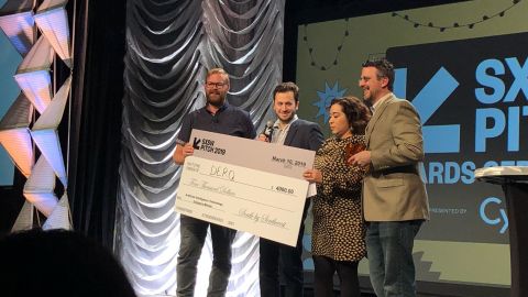 Georges Aoude, co-founder and CEO of Derq, receiving the SXSW 2019 best AI Startup award.